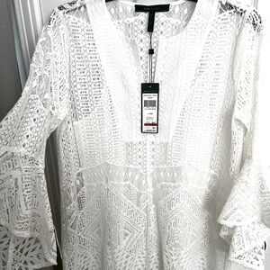 BCBG white dress with a lined slip. Size xxs, but a small in real size.